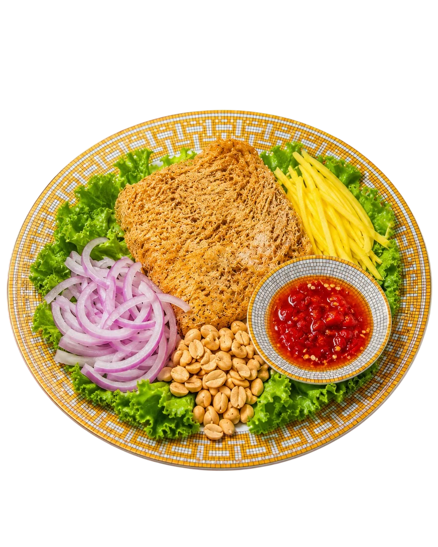 ยำปลาดุกฟู Crispy Rich จัดจานพร้อมมะม่วง หอมแดง ถั่วลิสง และน้ำยำ